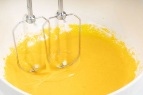 Step 2: Whisk the egg yolks.