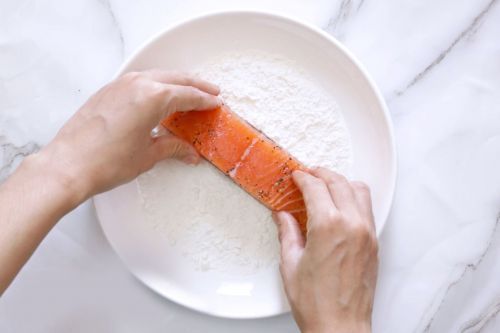 step 2: Flour coat the salmon