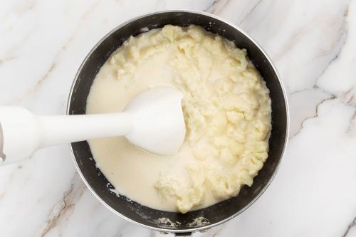 Cook cauliflower with sauce ingredients, then blend until smooth.