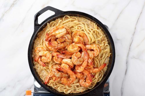Add the spaghetti and shrimp.
