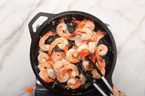 step 4: Add the shrimp to cook.