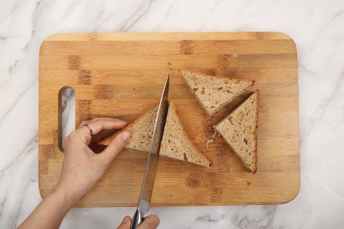 Step 1: Quarter the sandwich bread.
