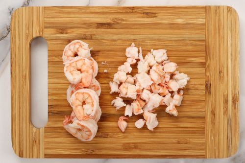Step 4: Chop the shrimps into 1/2-inch pieces and add them to a mixing bowl.