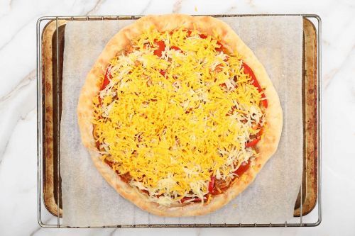 Step 10: Sprinkle with cheese.