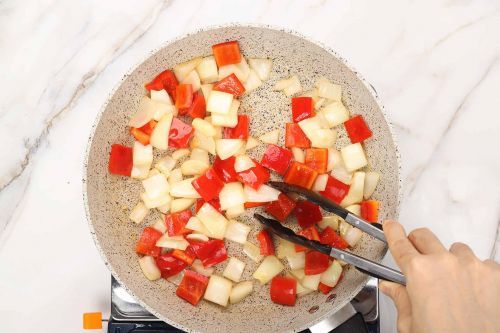 Step 2: Stir-fry the vegetables. Set aside.