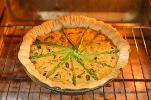 step 11: Pour into the pie crust. Place asparagus on top, and bake.