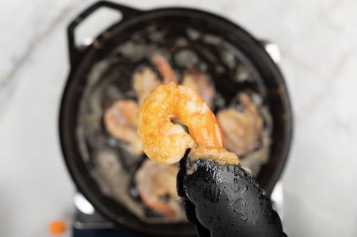 step 3: When the oil’s hot, fry the battered shrimp.